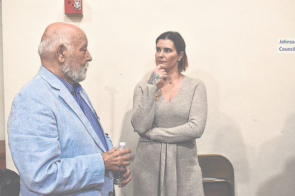 Republican incumbent Johnson County Council member Ron Deer, left, and Democratic candidate Blythe Potter speak following the voter forum on Tuesday, April 23, 2024, at the Johnson County Museum of Hi