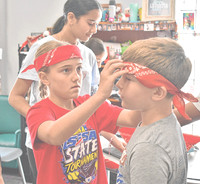 Clark Elementary students learn story of ‘The Man in the Red Bandana’ for 9/11