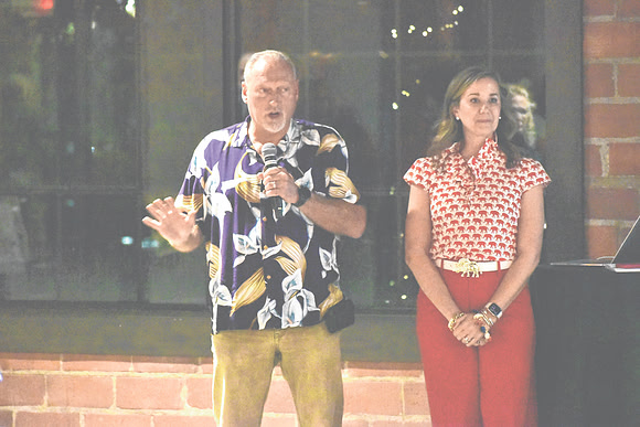 Johnson County Commissioner Brian, Baird, speaks about winning his uncontested race while GOP Chair Beth Boyce looks on at the Johnson County GOP Election Night Watch Party, Tuesday, Nov. 5, 2024, at